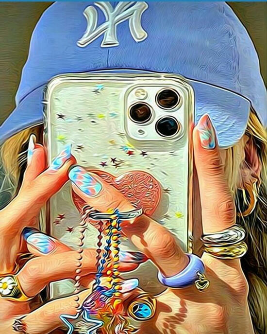 Картина по номерам 40x50 Девушка в кепке и с телефоном